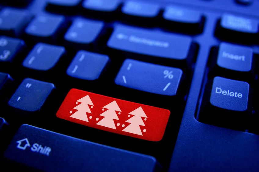 keyboard with Christmas tree icons on "enter" key