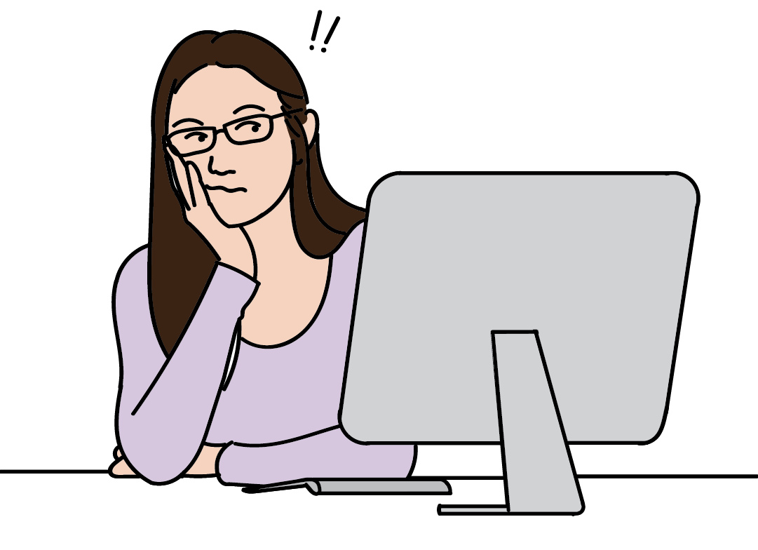 Woman looking disappointed looking at her computer screen